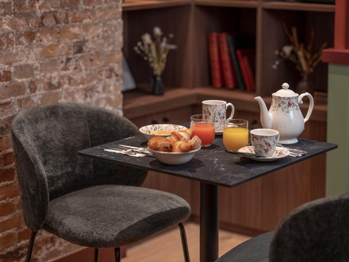 Hotel Brittany Paris Bagian luar foto